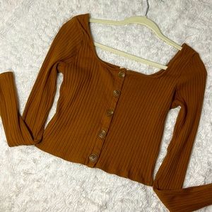 Burnt orange long sleeve shirt. Good condition, size M